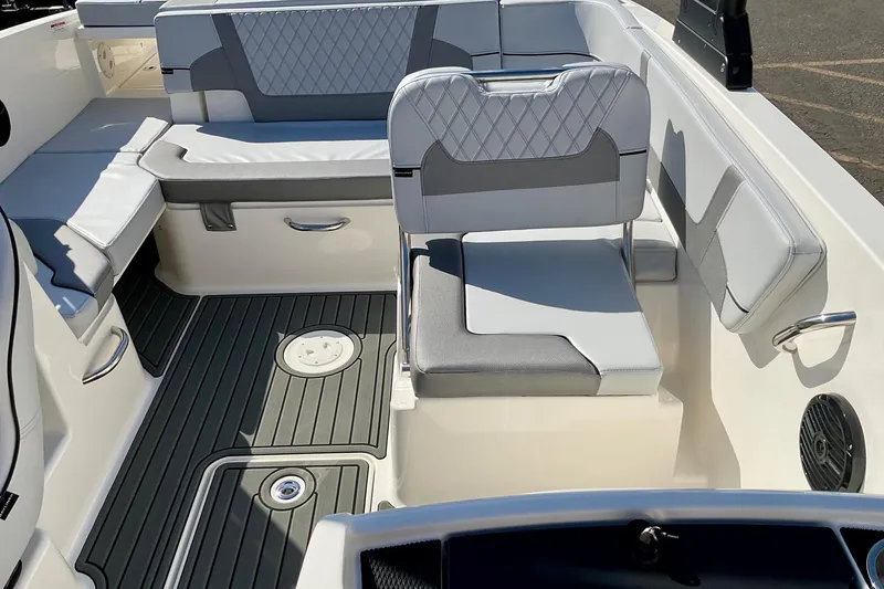 Slide: The Image of 2026 Bayliner VR6 Bowrider I/O interior with gray and white seating, modern design. - 9