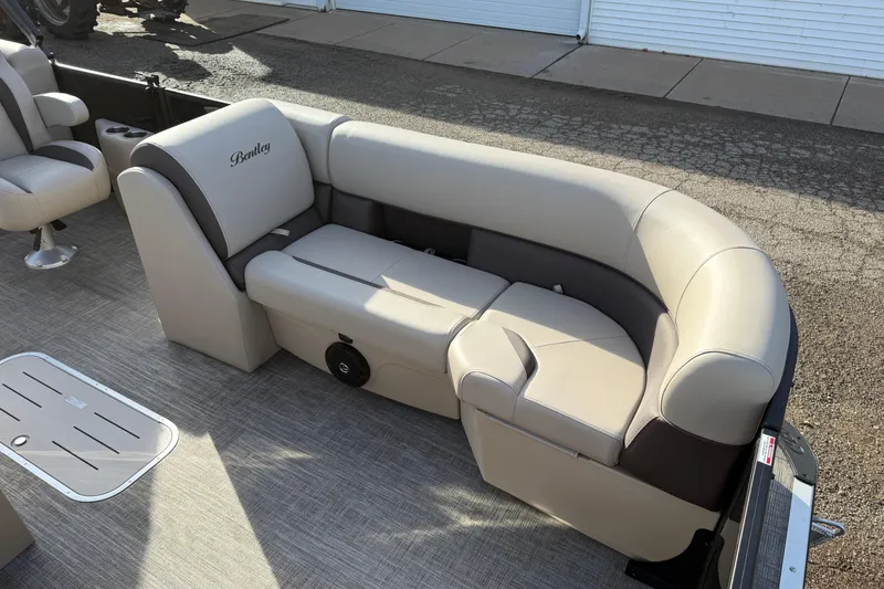 Slide: The Image of 2026 Bentley Pontoons Legacy 223 Navigator with luxurious beige seating. - 10