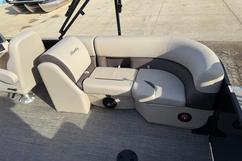 Slide: The Image of 2026 Bentley Pontoons Legacy 223 Navigator interior seating, beige and brown upholstery. - 22