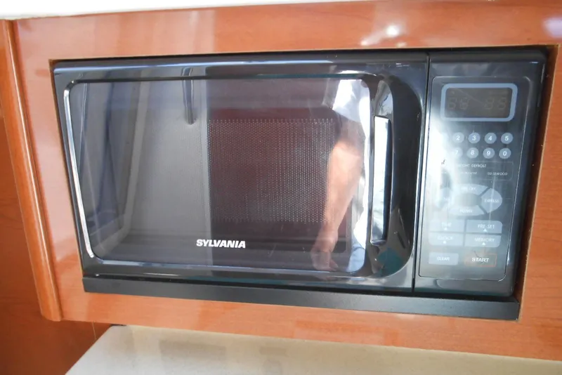 Slide: The Image of Sylvania microwave in 2008 Sea Ray 260 Sundancer boat kitchen. - 18
