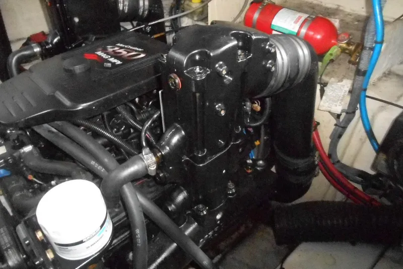 Slide: The Image of Engine compartment of a 2008 Sea Ray 260 Sundancer boat, featuring detailed components. - 30