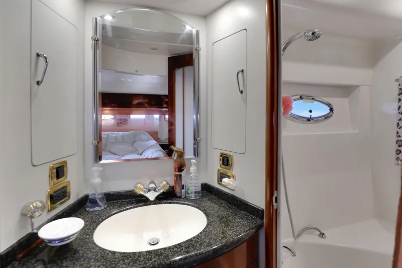 Slide: The Image of Luxurious bathroom in 2005 Carver 560 Voyager yacht with elegant fixtures and shower. - 66