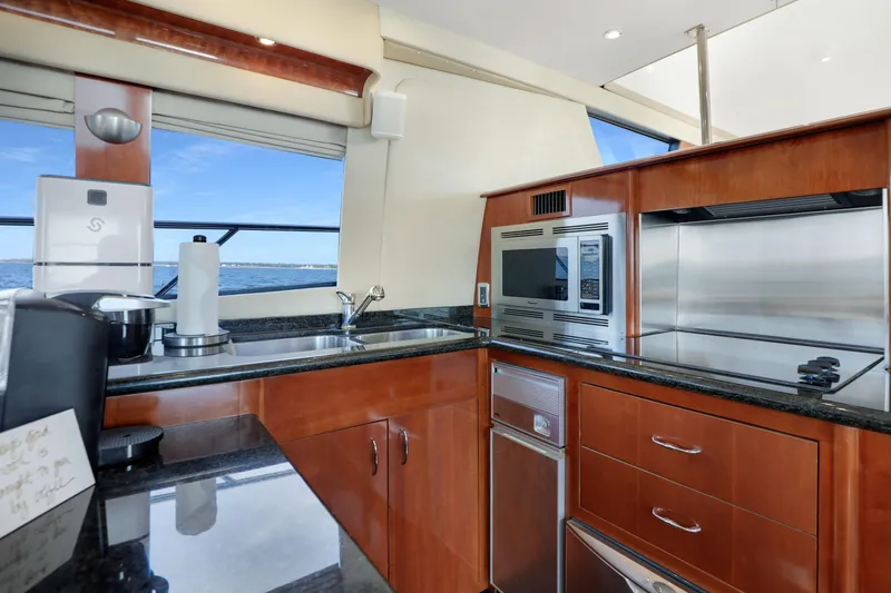 Slide: The Image of Luxurious kitchen interior of 2005 Carver 560 Voyager yacht with modern appliances. - 47