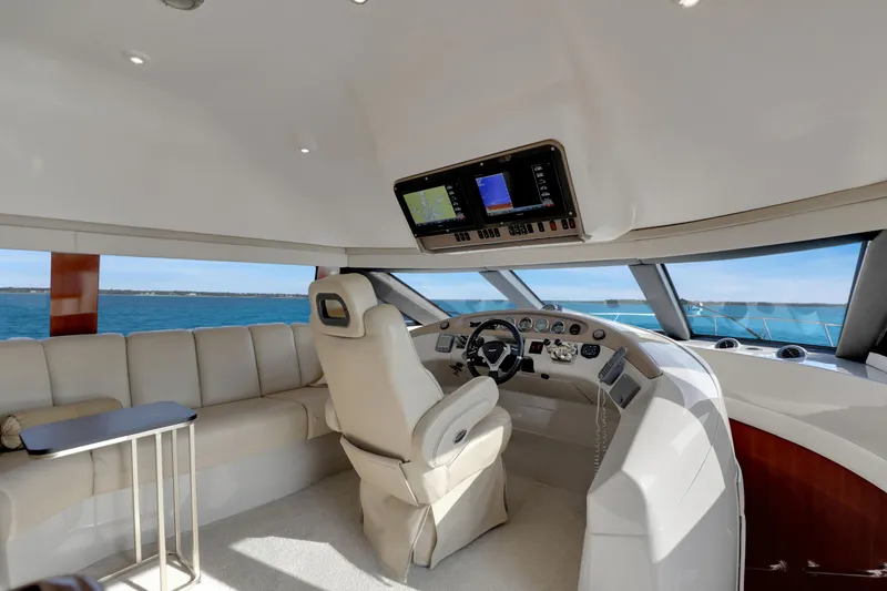 Slide: The Image of Luxurious interior of 2005 Carver 560 Voyager yacht with panoramic ocean view. - 52