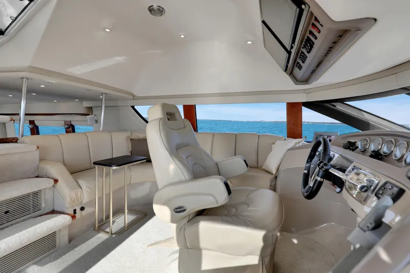 Slide: The Image of Luxurious interior of 2005 Carver 560 Voyager yacht with plush seating and ocean view. - 57