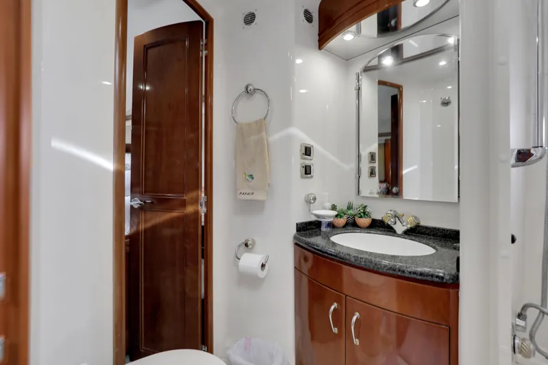 Slide: The Image of Luxurious bathroom in 2005 Carver 560 Voyager yacht with elegant wood accents and modern fixtures. - 71