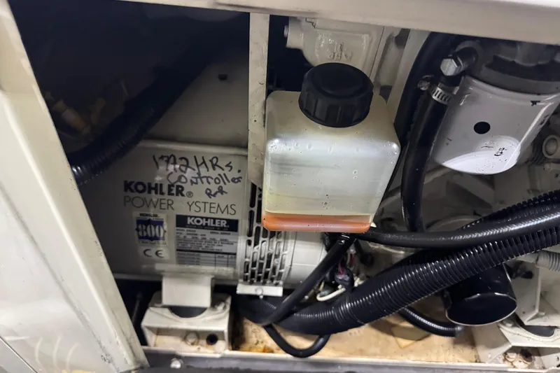 Slide: The Image of Engine compartment of a 2005 Carver 560 Voyager with Kohler power system. - 81