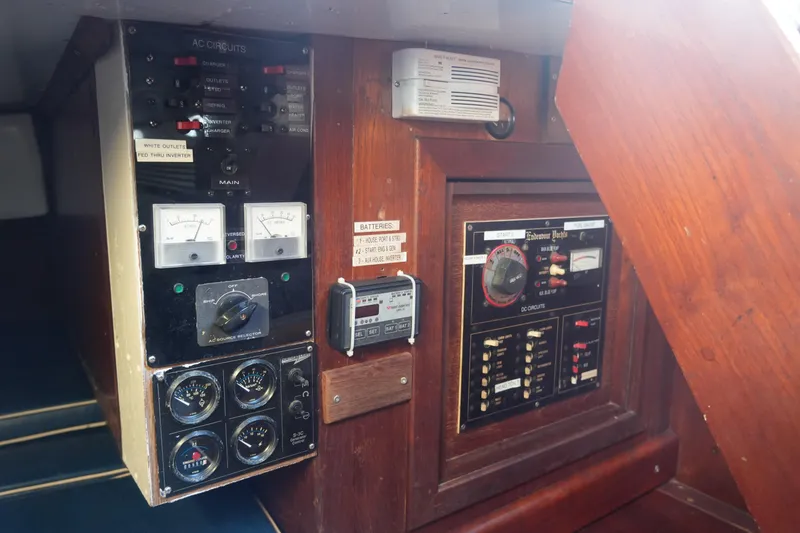 Slide: The Image of Electrical control panel inside a 1979 Endeavour 37 sailboat cabin. - 26