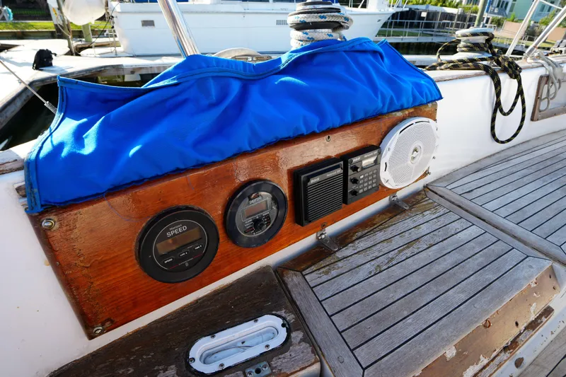 Slide: The Image of Control panel on a 1979 Endeavour 37 sailboat with gauges and speaker. - 9