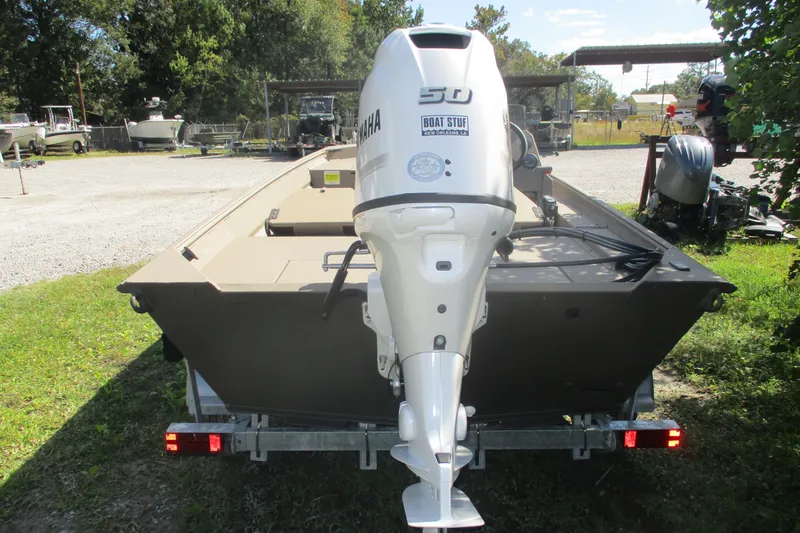 Slide: The Image of 2025 Alweld 1652 Marsh boat with Yamaha outboard motor on trailer. - 2