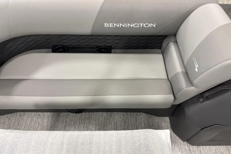 Slide: The Image of 2026 Bennington 22 SSRSE boat interior with gray seating and quilted backrest. - 19
