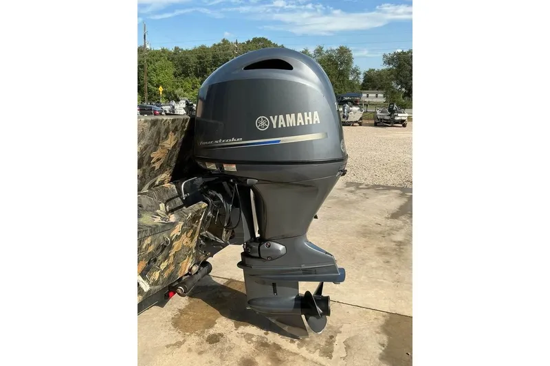Slide: The Image of 2015 Ranger RT188 with Yamaha outboard motor in outdoor setting. - 6