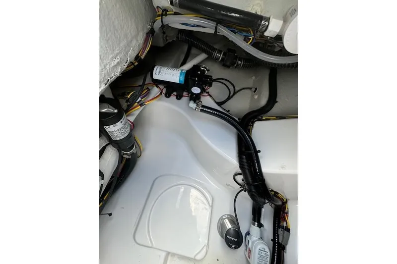Slide: The Image of Interior view of 2025 Sportsman Masters 267OE Bay Boat wiring and components. - 15