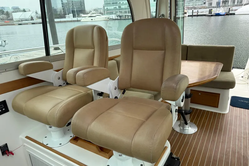 Slide: The Image of Raymarine display on 2014 Back Cove 37 boat, showing height, beam, and draft measurements. - 6