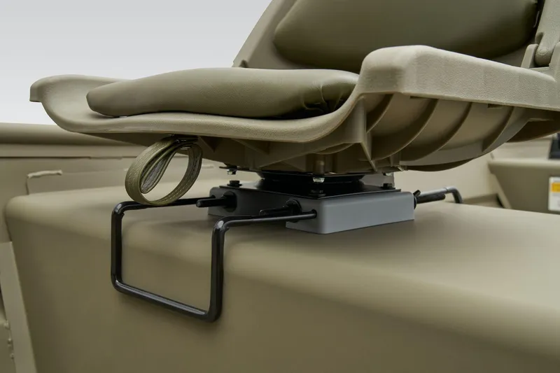 Slide: The Image of Manufacturer Provided Image: 2025 Tracker Grizzly 14 Jon boat seat detail, featuring a sturdy mounting bracket. - 32
