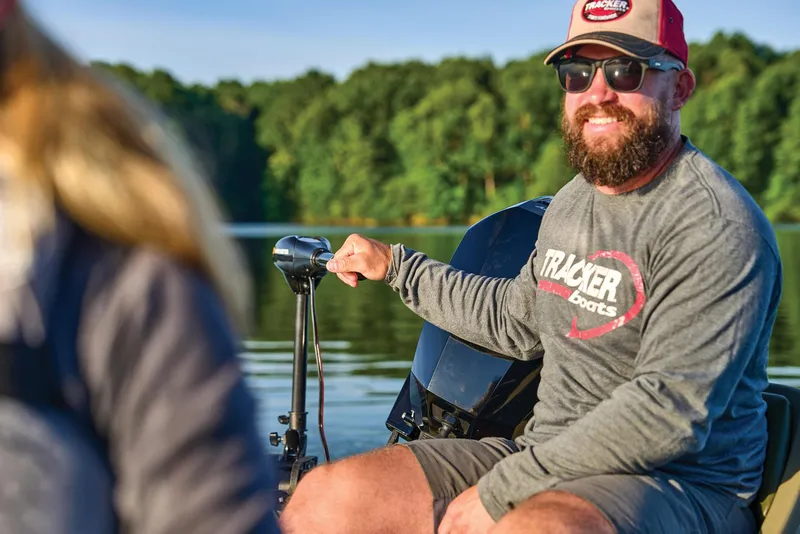 Slide: The Image of Manufacturer Provided Image: Man enjoying a ride on a 2025 Tracker Grizzly 14 Jon boat. - 45