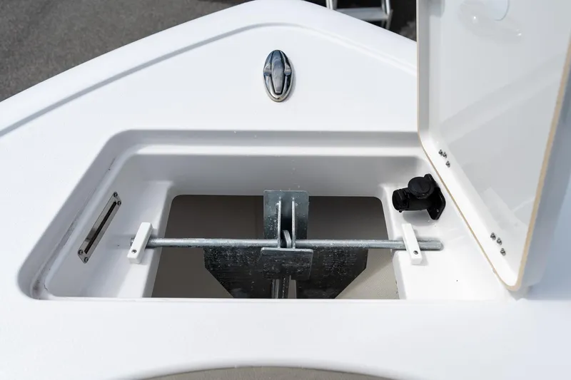 Slide: The Image of Anchor storage compartment on 2025 Sportsman Open 212 Center Console boat. - 42