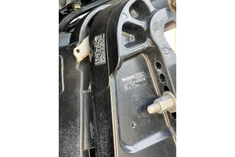 Slide: The Image of Close-up of a Suzuki outboard motor part on a 1999 Aluminum Boat. - 8