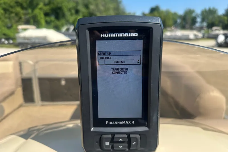 Slide: The Image of Humminbird PiranhaMAX 4 fish finder on 2013 Sweetwater 2086 RE boat dashboard. - 11