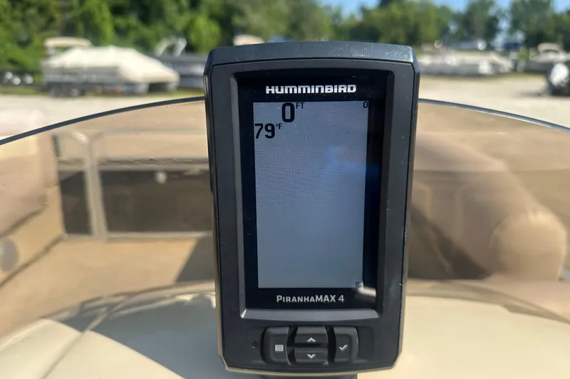 Slide: The Image of Humminbird PiranhaMAX 4 fish finder on 2013 Sweetwater 2086 RE boat, displaying 79°F temperature. - 12