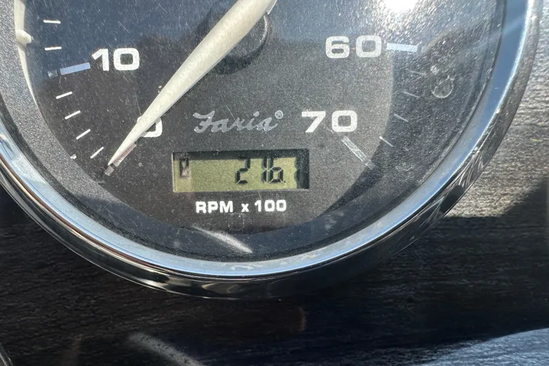 Slide: The Image of Tachometer reading 21.6 RPM x 100 on 2013 Sweetwater 2086 RE boat. - 9
