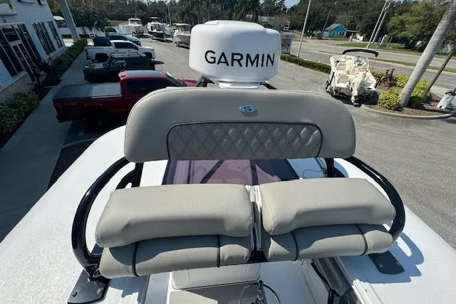 Slide: The Image of 2025 Sportsman Open 282 Center Console with Garmin radar, docked in a marina. - 11