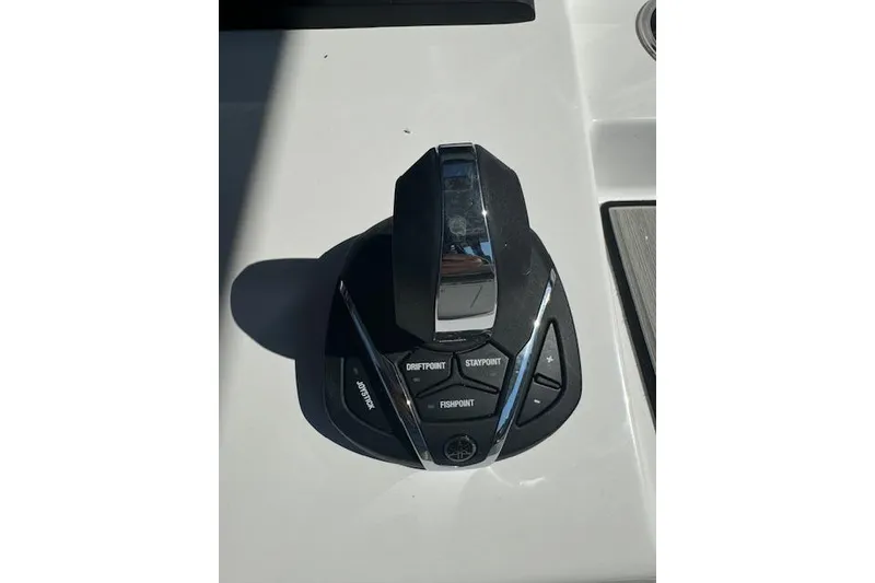 Slide: The Image of 2025 Sportsman Open 282 Center Console joystick control panel. - 13