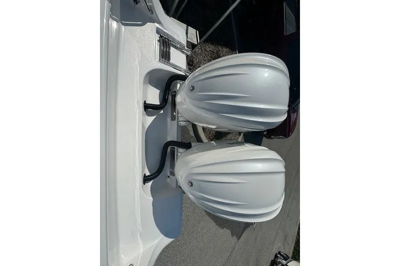 Slide: The Image of 2025 Sportsman Open 282 Center Console with dual outboard motors, top view. - 26