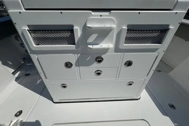 Slide: The Image of 2025 Sportsman Open 282 Center Console storage compartments with sleek design and efficient organization. - 27