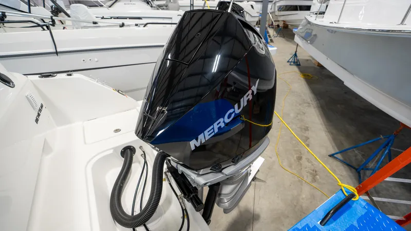 Slide: The Image of 2023 Beneteau Flyer 8 SPACEdeck with Mercury outboard engine in a showroom. - 30