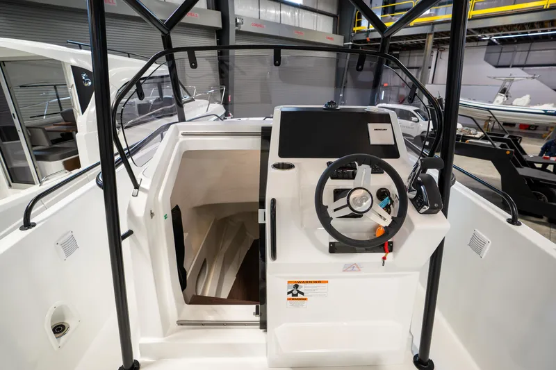 Slide: The Image of 2023 Beneteau Flyer 8 SPACEdeck helm with modern controls and spacious cockpit. - 7