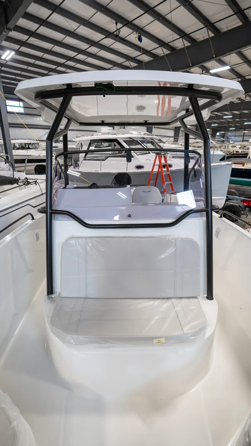 Slide: The Image of 2023 Beneteau Flyer 8 SPACEdeck boat in showroom, showcasing sleek design and spacious deck. - 27