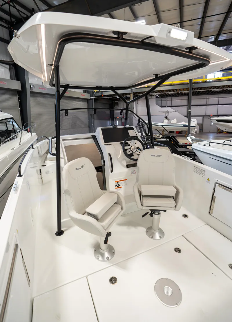 Slide: The Image of 2023 Beneteau Flyer 8 SPACEdeck boat interior with seating and helm station. - 15