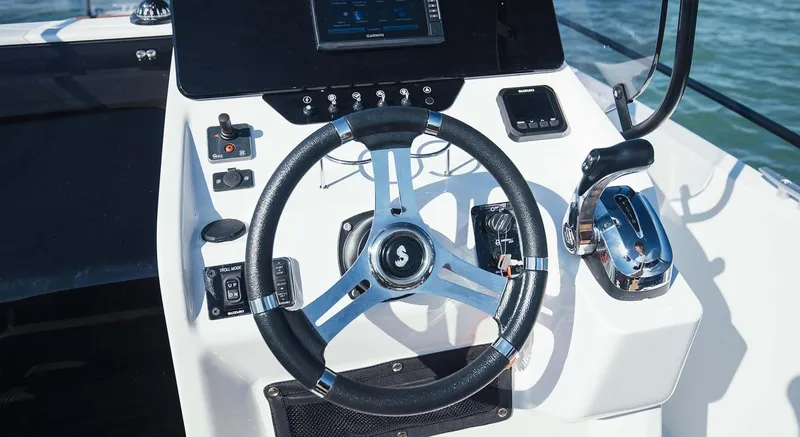 Slide: The Image of 2023 Beneteau Flyer 8 SPACEdeck helm with steering wheel and controls. - 20