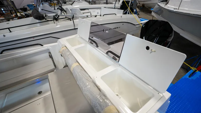 Slide: The Image of 2023 Beneteau Flyer 8 SPACEdeck interior with storage compartments and seating. - 13