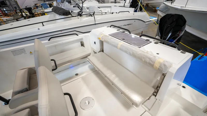 Slide: The Image of 2023 Beneteau Flyer 8 SPACEdeck interior with seating and storage features. - 29
