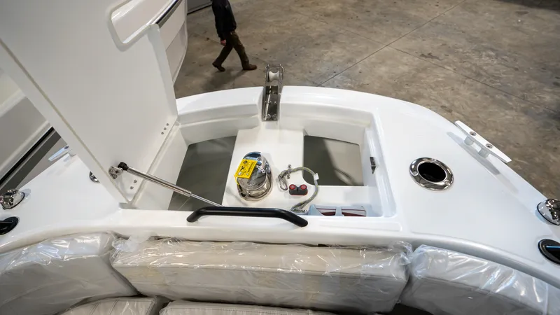 Slide: The Image of 2023 Beneteau Flyer 8 SPACEdeck storage compartment with open hatch and accessories. - 9