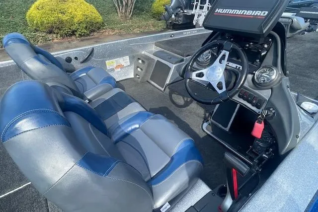 Slide: The Image of 2012 Skeeter ZX20 boat interior with steering wheel and Humminbird electronics. - 10