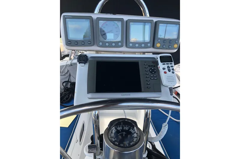 Slide: The Image of Cockpit navigation instruments on a 2001 Catalina 34 Mk II sailboat. - 5