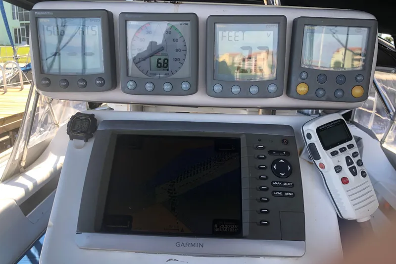 Slide: The Image of Control panel of a 2001 Catalina 34 Mk II sailboat with navigation instruments. - 6