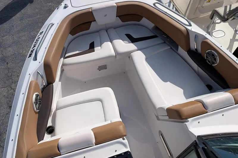 Slide: The Image of 2019 Four Winns H290 OB boat interior with white and brown seating. - 20