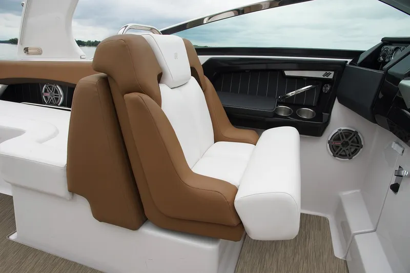 Slide: The Image of Manufacturer Provided Image: 2019 Four Winns Horizon H290 OB boat interior with brown and white seating. - 34