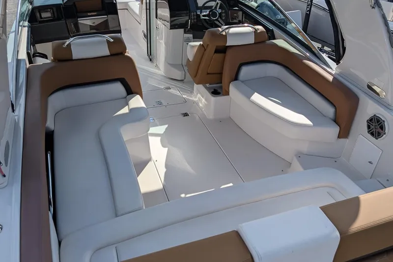 Slide: The Image of 2019 Four Winns H290 OB boat interior with spacious seating and modern design. - 6