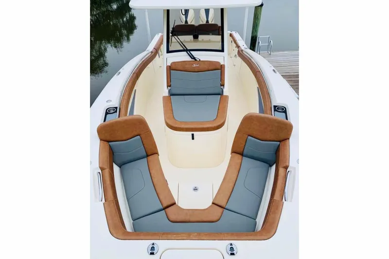 Slide: The Image of Manufacturer Provided Image: 2025 Scout 305 LXF boat interior with luxurious seating and modern design. - 3