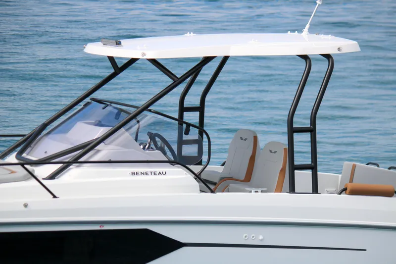 Slide: The Image of 2023 Beneteau Flyer 8 SUNdeck boat on water, showcasing sleek design and modern features. - 12