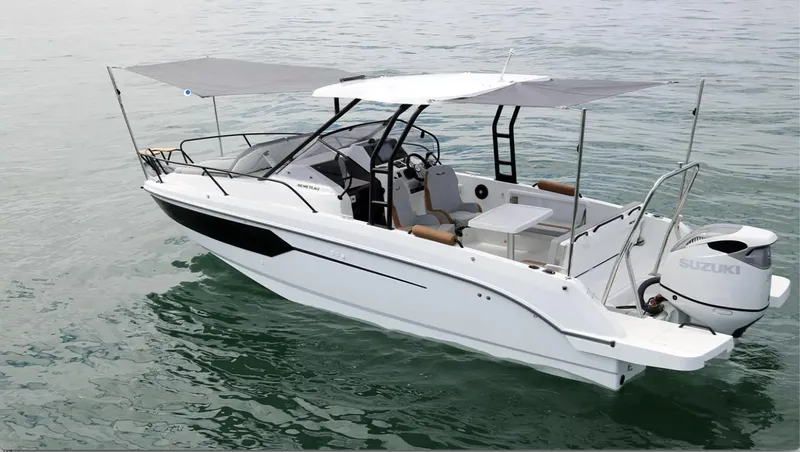 Slide: The Image of 2023 Beneteau Flyer 8 SUNdeck boat on water, featuring sleek design and spacious deck. - 16