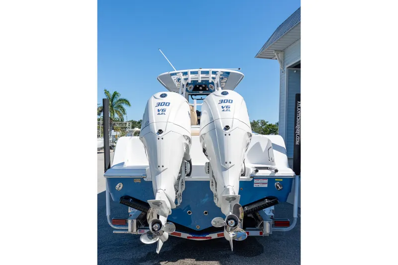 Slide: The Image of 2026 Sportsman Open 282 Center Console with twin 300 V6 engines, rear view. - 19