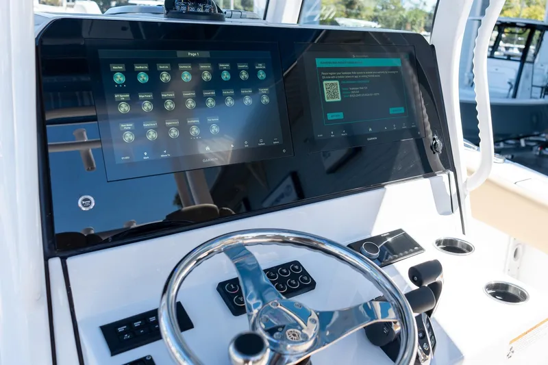 Slide: The Image of 2026 Sportsman Open 282 Center Console dashboard with advanced touchscreen controls. - 26