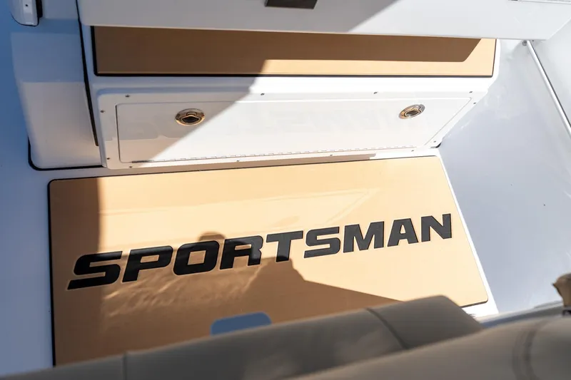 Slide: The Image of 2026 Sportsman Open 282 Center Console boat interior with logo mat. - 42