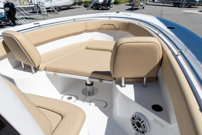 Slide: The Image of 2026 Sportsman Open 282 Center Console boat with tan seating and spacious deck. - 49